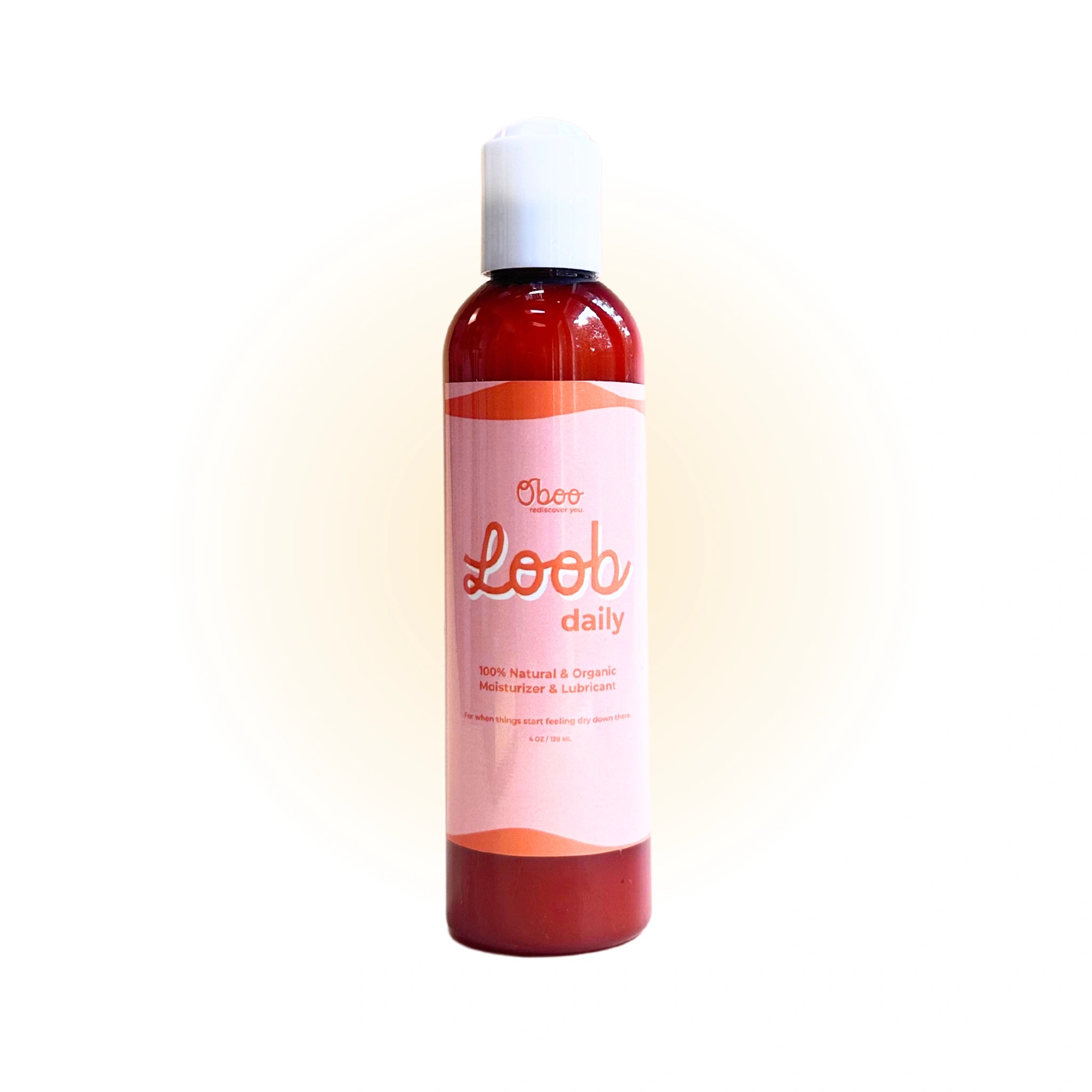 Bottle of Loob Daily lubricant with sliced oranges, highlighting aloe, botanicals, and sweet orange oil benefits in bold orange text.