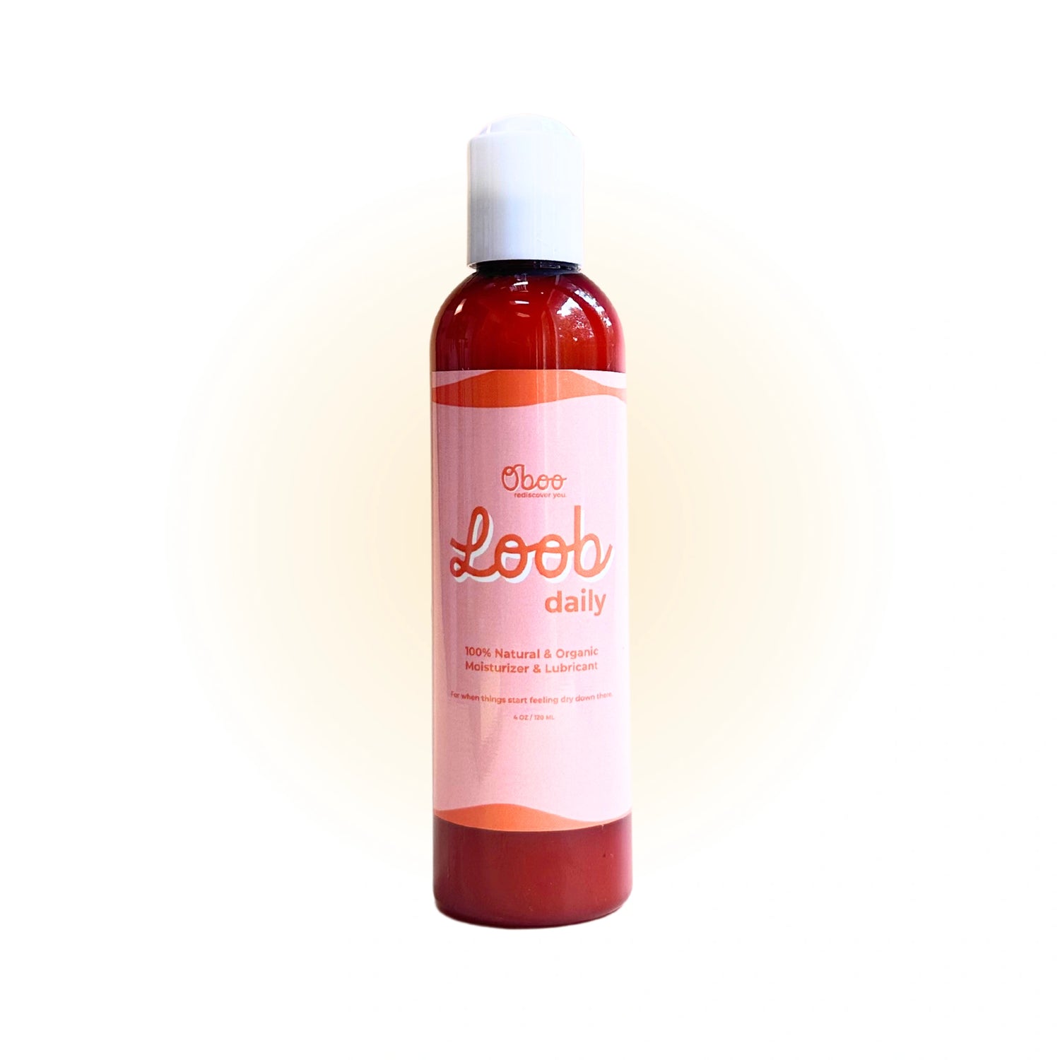 Bottle of Loob Daily lubricant with sliced oranges, highlighting aloe, botanicals, and sweet orange oil benefits in bold orange text.