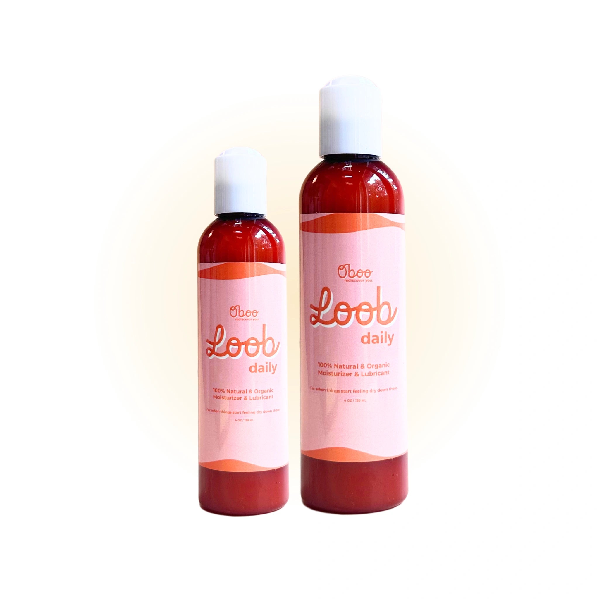 Two Loob Daily bottles in different sizes on a soft background, promoting organic moisturizing and lubrication options for intimate care.