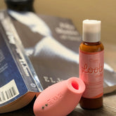 Loob Daily bottle with text describing its self-care, intimacy, and clean ingredients benefits, emphasizing estrogen-free and fragrance-free formulation.