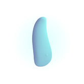 A light blue flexible massager with a smooth curved shape is displayed against a soft gradient blue background, showing its power button.