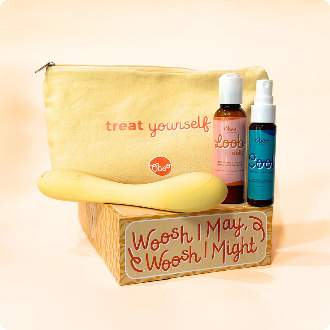A yellow pouch labeled “treat yourself” sits with Loob Daily, Cool Spray, and a wand on top of a product box.