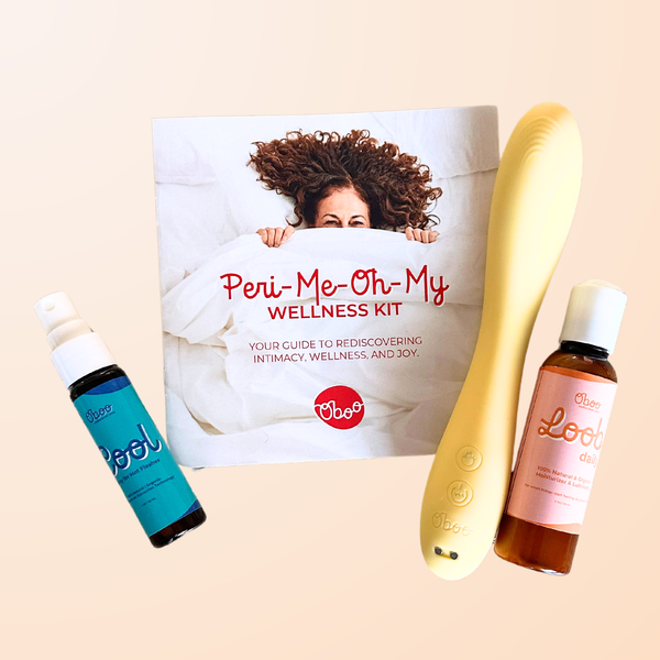 Oboo Peri-Me-Oh-My Wellness Kit with a bottle, yellow wand, and lube on a peach background