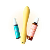 Oboo product trio featuring a blue cooling spray, yellow vibrator, and daily lubricant displayed against a white background.