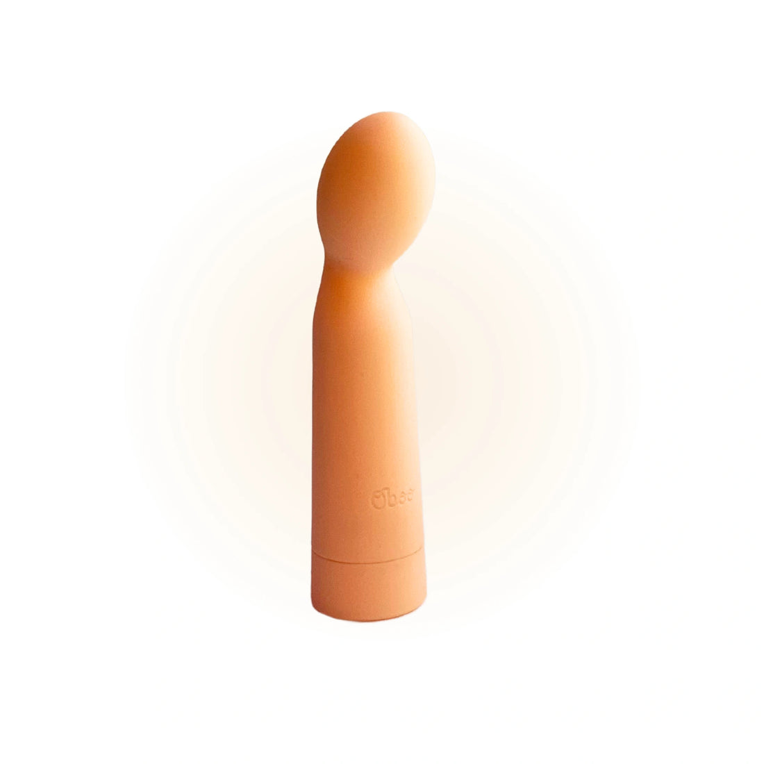 Shoop bullet massager shown upright, centered with a soft glow effect, highlighting its smooth texture and minimalist design.