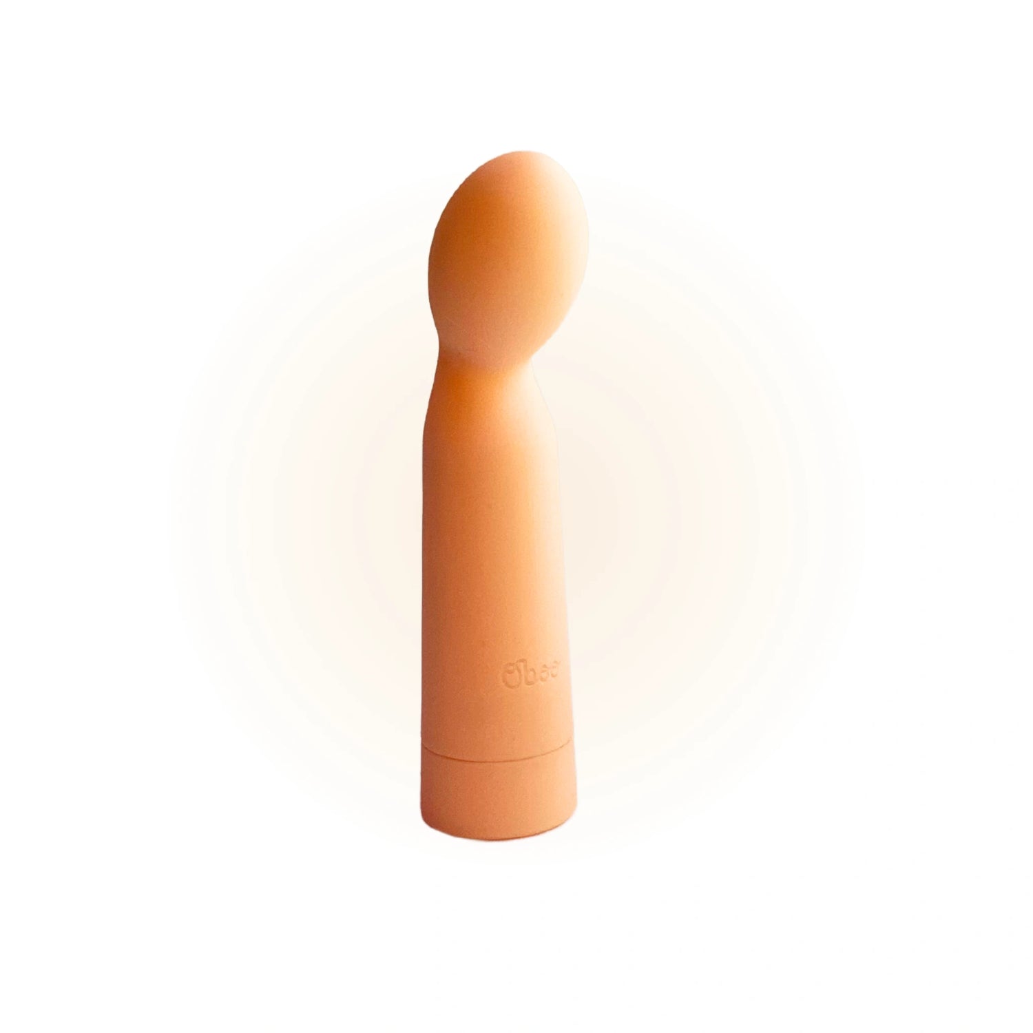 Shoop bullet massager shown upright, centered with a soft glow effect, highlighting its smooth texture and minimalist design.