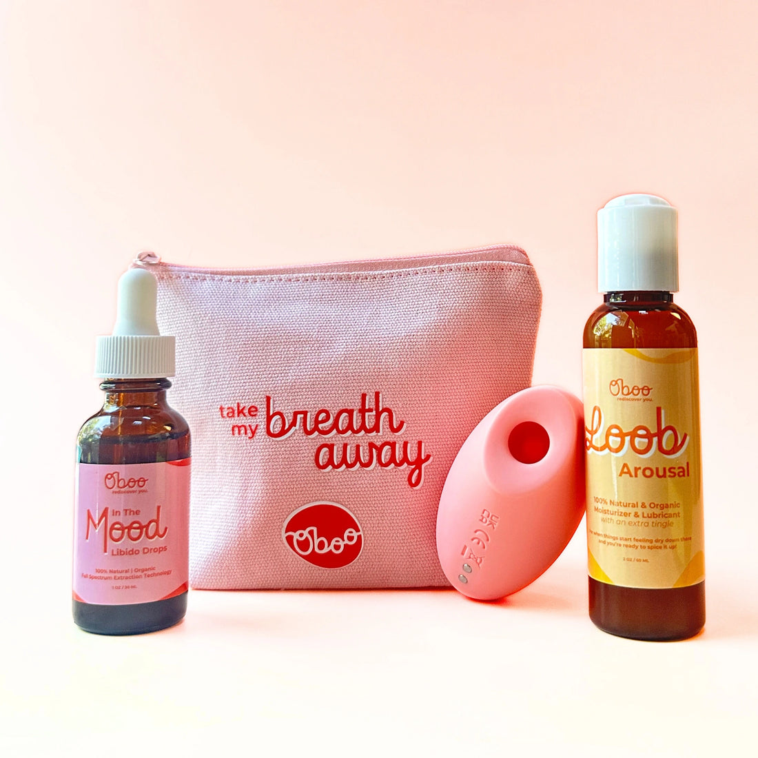 Three Oboo products – Libido Drops, Arousal Loob, and a pink stimulator – displayed against a soft pink background.