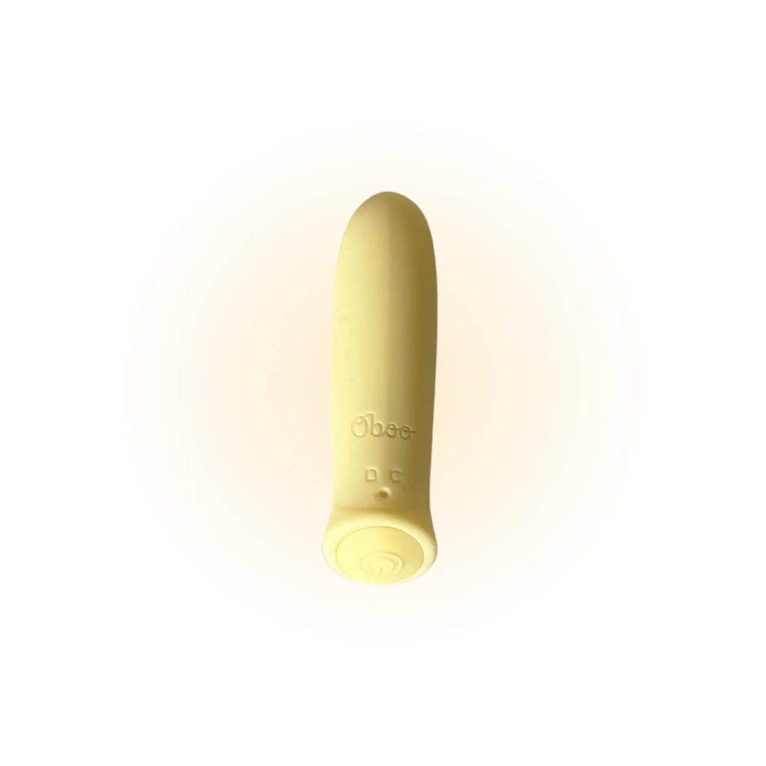 A yellow Woo massager with a rounded tip and power button is shown vertically against a soft yellow gradient 
