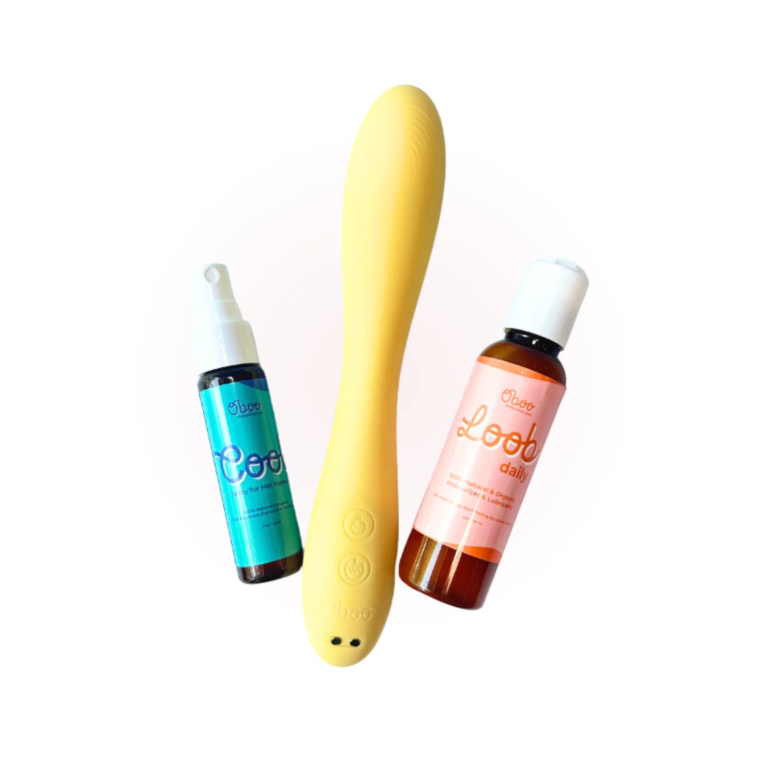 Cooch to Oh My core trio — Cool Spray for Hot Flashes, yellow Woosh Warming Wand, and Loob Daily Moisturizer on a soft pink background