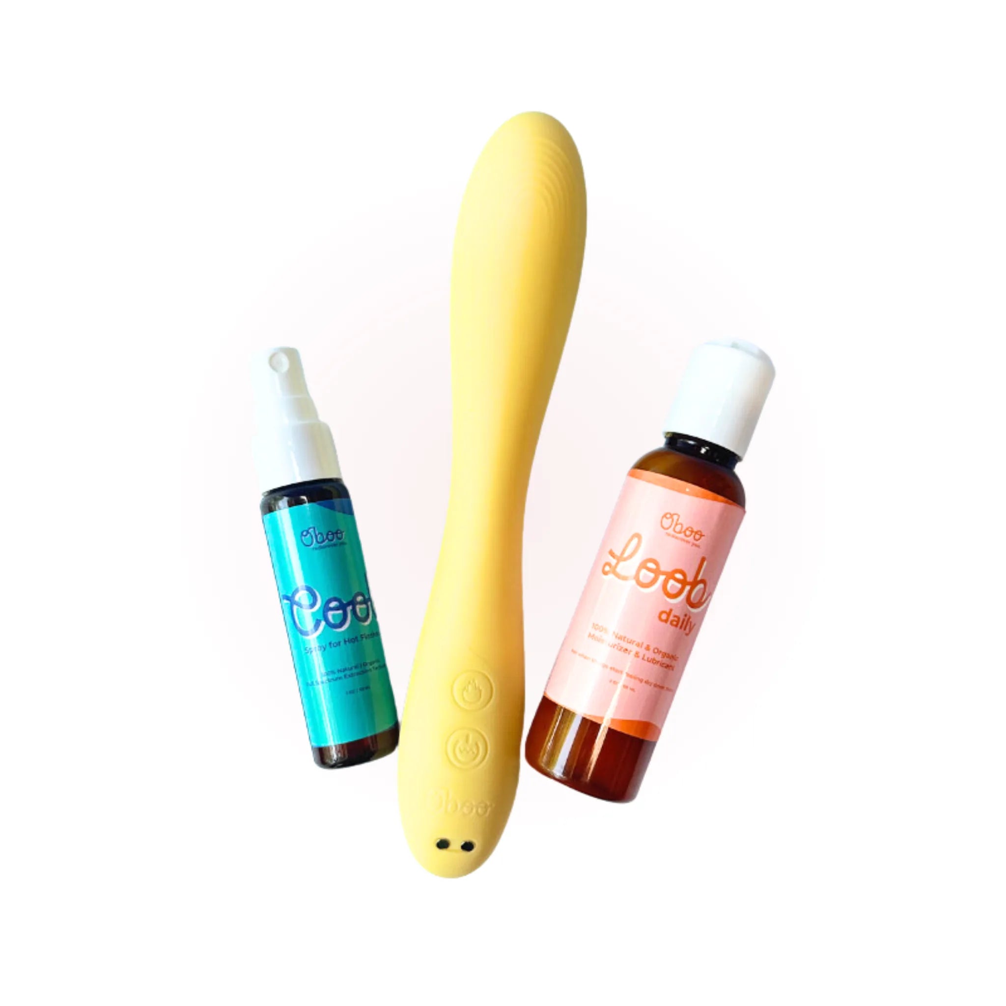 Cooch to Oh My core trio — Cool Spray for Hot Flashes, yellow Woosh Warming Wand, and Loob Daily Moisturizer on a soft pink background